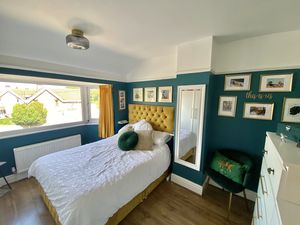 Bedroom One- click for photo gallery